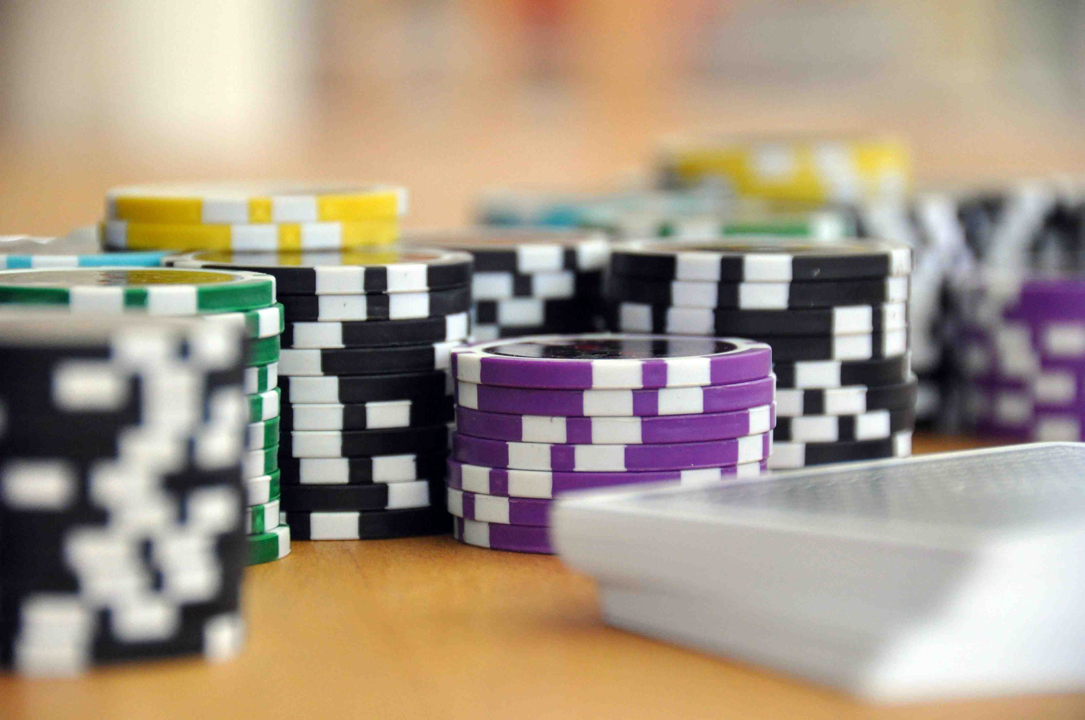 Philippine bettor checking live sports odds on mobile phone
